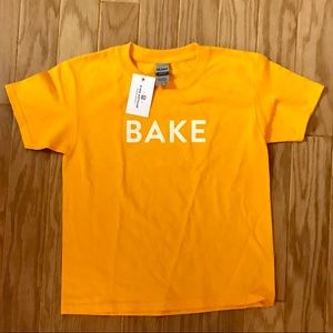 3/$10🎁 NWT “BAKE” T-SHIRT